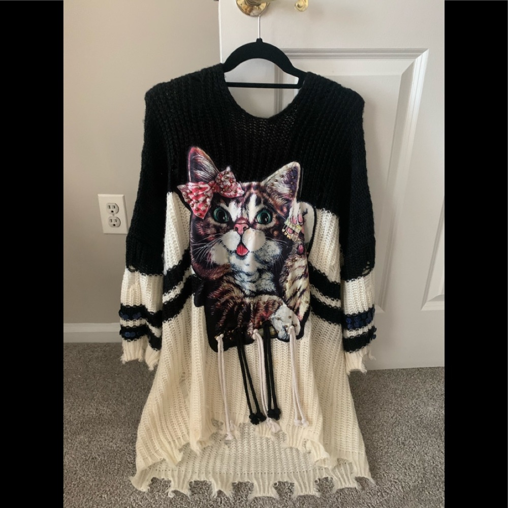Extremely cute and unique looking jumper or cardig